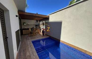 Imagem: A casa em condomínio possui 4 Dormitórios, 4 Banheiros, 2