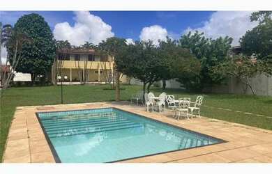 Imagem: A casa em condomínio possui 3 Dormitórios, 5 Banheiros, 400m²