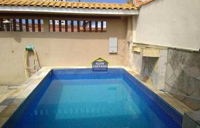 Imagem: A casa possui 3 Dormitórios, 2 Banheiros, 2 Vagas na garagem