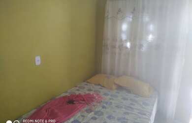 Imagem: A casa possui 4 Dormitórios e 4 Vagas na garagem e está localizado