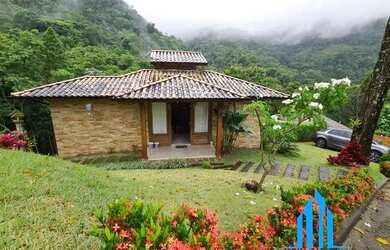 Imagem: A casa possui 3 Dormitórios, 2 Banheiros, 3 Vagas na garagem