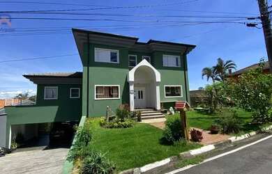 Imagem: A casa em condomínio possui 4 Dormitórios, 5 Banheiros, 4