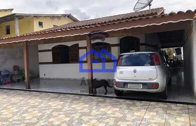 Imagem: A casa possui 2 Dormitórios, 1 Banheiro, 3 Vagas na garagem