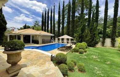 Imagem: A casa em condomínio possui 4 Dormitórios, 5 Banheiros, 5