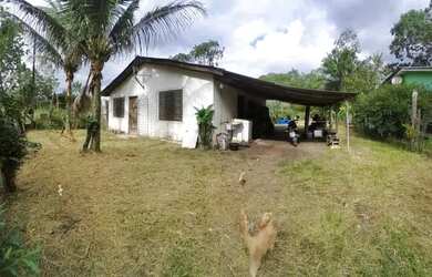 Imagem: A casa possui 2 Dormitórios, 2 Banheiros, 3 Vagas na garagem