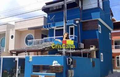 Imagem: A casa possui 3 Dormitórios, 4 Banheiros, 1 Vaga na garagem