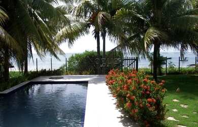 Imagem: A casa possui 5 Dormitórios, 5 Banheiros, 5 Vagas na garagem