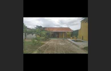 Imagem: A casa possui 4 Dormitórios, 4 Vagas na garagem e está localizado