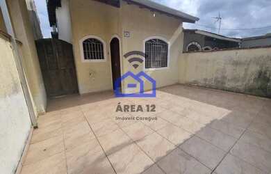 Imagem: A casa possui 2 Dormitórios, 1 Banheiro, 2 Vagas na garagem