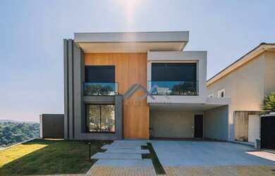 Imagem: A casa em condomínio possui 4 Dormitórios, 5 Banheiros, 4