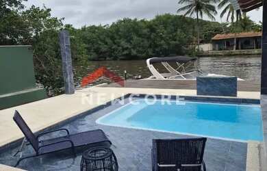 Imagem: A casa possui 3 Dormitórios, 4 Banheiros, 2 Vagas na garagem