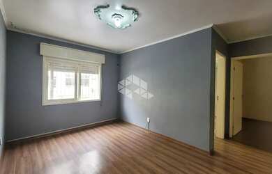 Imagem: O apartamento possui 2 Dormitórios, 1 Banheiro, 2 Vagas na