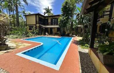 Imagem: A casa em condomínio possui 4 Dormitórios, 3 Banheiros, 2