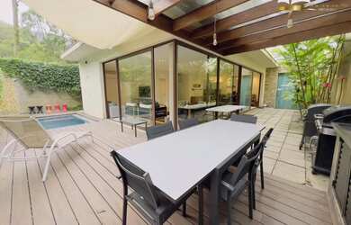 Imagem: A casa em condomínio possui 5 Dormitórios, 5 Banheiros, 2