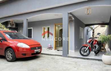 Imagem: A casa possui 2 Dormitórios, 2 Banheiros, 4 Vagas na garagem