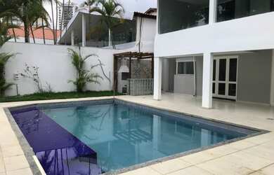 Imagem: A casa em condomínio possui 5 Dormitórios, 5 Banheiros, 4