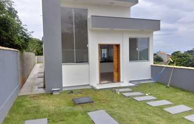 Imagem: A casa possui 3 Dormitórios, 2 Banheiros, 3 Vagas na garagem