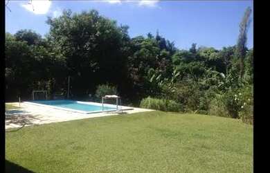 Imagem: A casa possui 3 Dormitórios, 3 Banheiros, 5 Vagas na garagem