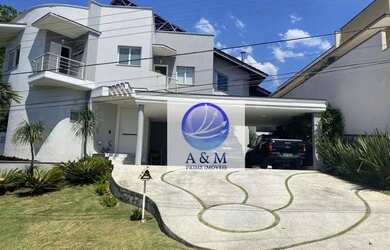 Imagem: A casa possui 4 Dormitórios, 5 Banheiros, 420m² de Área e