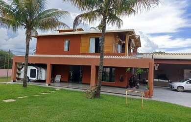 Imagem: A casa possui 5 Dormitórios, 5 Banheiros, 5 Vagas na garagem