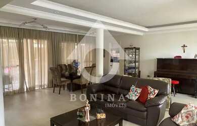 Imagem: A casa em condomínio possui 4 Dormitórios, 4 Banheiros, 4