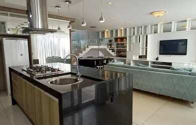 Imagem: A casa possui 3 Dormitórios, 5 Banheiros, 4 Vagas na garagem