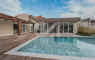 Imagem: A casa em condomínio possui 5 Dormitórios, 5 Banheiros, 5