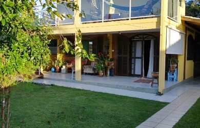 Imagem: A casa possui 3 Dormitórios, 4 Banheiros, 4 Vagas na garagem