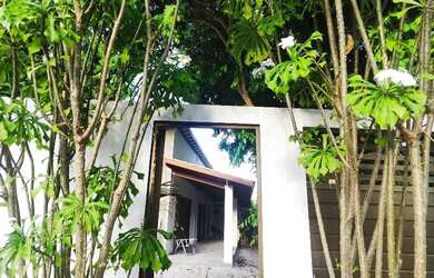 Imagem: A casa possui 3 Dormitórios, 3 Banheiros, 2 Vagas na garagem