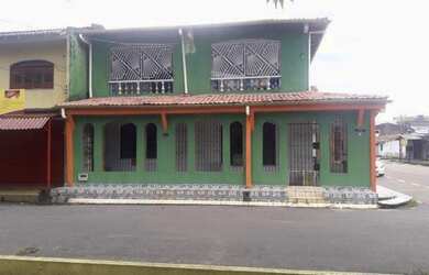 Imagem: A casa possui 5 Dormitórios, 4 Banheiros, 2 Vagas na garagem