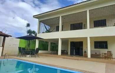 Imagem: A casa à venda possui 5 Dormitórios e 3 Vagas na garagem e