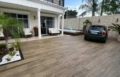 Imagem: A casa em condomínio possui 4 Dormitórios, 5 Banheiros, 4