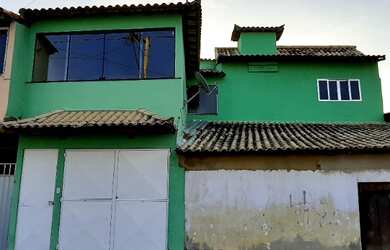 Imagem: A casa possui 3 Dormitórios, 1 Banheiro, 1 Vaga na garagem
