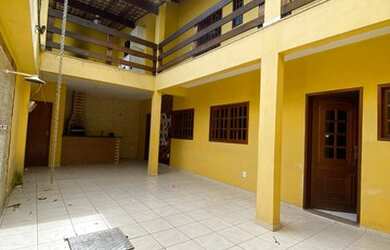 Imagem: A casa possui 2 Dormitórios, 3 Banheiros, 3 Vagas na garagem