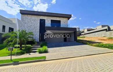 Imagem: A casa possui 4 Dormitórios, 5 Banheiros, 5 Vagas na garagem