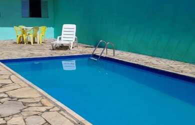 Imagem: A casa possui 4 Dormitórios, 2 Banheiros, 4 Vagas na garagem