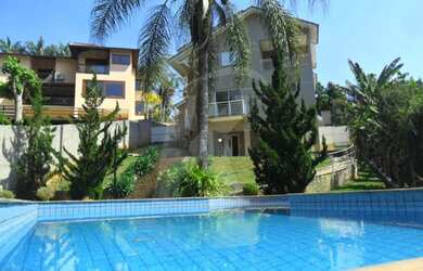 Imagem: A casa em condomínio possui 4 Dormitórios, 2 Banheiros, 3