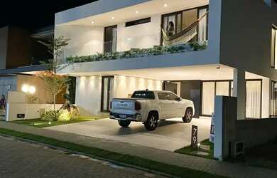 Imagem: A casa em condomínio possui 5 Dormitórios, 5 Banheiros, 4