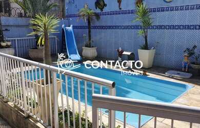 Imagem: A casa possui 3 Dormitórios, 3 Banheiros, 2 Vagas na garagem