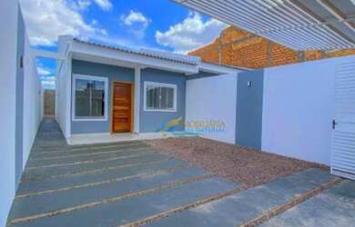 Imagem: A casa possui 2 Dormitórios, 1 Banheiro, 2 Vagas na garagem