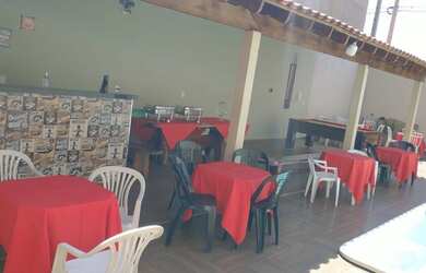 Imagem: A casa possui 1 Dormitório, 4 Vagas na garagem e está localizado