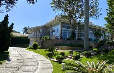 Imagem: A casa em condomínio possui 4 Dormitórios, 5 Banheiros, 5