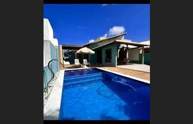 Imagem: A casa possui 4 Dormitórios, 4 Vagas na garagem e está localizado