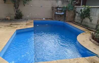 Imagem: A casa possui 5 Dormitórios, 3 Banheiros, 5 Vagas na garagem