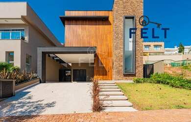 Imagem: A casa em condomínio possui 4 Dormitórios, 5 Banheiros, 4