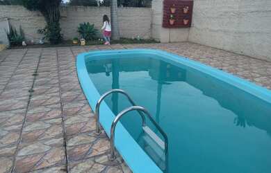 Imagem: A casa possui 2 Dormitórios, 2 Banheiros, 5 Vagas na garagem