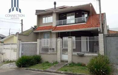 Imagem: A casa possui 3 Dormitórios, 4 Banheiros, 3 Vagas na garagem