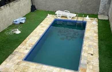 Imagem: A casa em condomínio possui 3 Dormitórios e está localizado