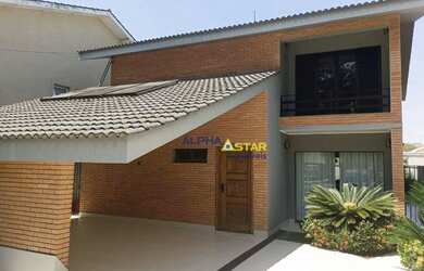 Imagem: A casa em condomínio e possui 3 Dormitórios, 5 Banheiros