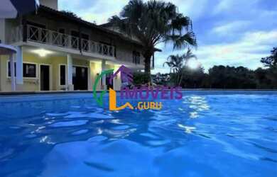 Imagem: A casa possui 5 Dormitórios, 4 Banheiros, 5 Vagas na garagem